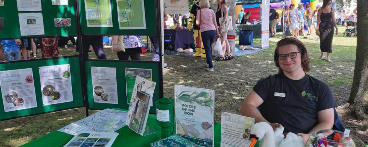 A Don Catchment Rivers Trust stall at a community event, with information displays and activities celebrating the River Rother.