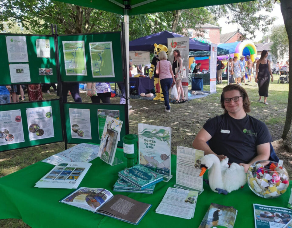 A Don Catchment Rivers Trust stall at a community event, with information displays and activities celebrating the River Rother.